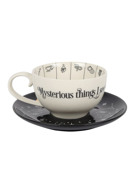 Teetasse und Untertasse mit himmlischen und mystischen Motiven.